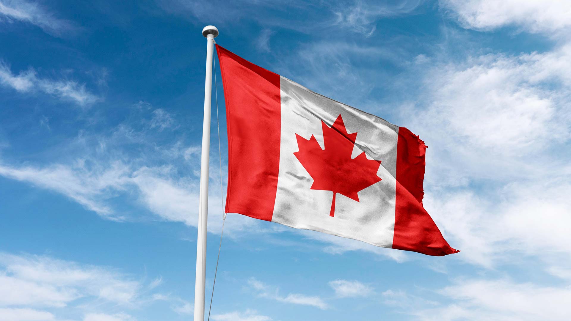 Canadian flag waving in the wind